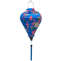 Balloon shaped Vietnamese lantern with pink and yellow roses on a light blue background.