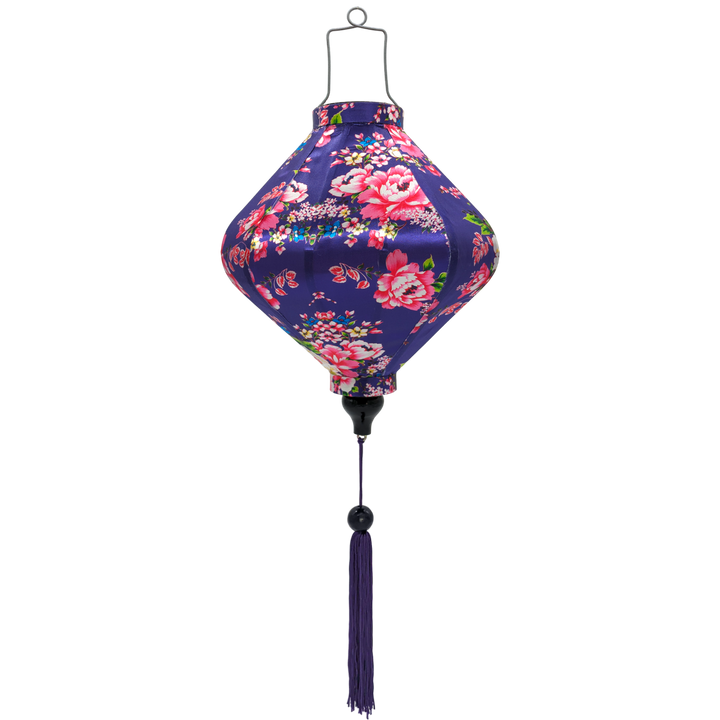 Floral-patterned purple silk lantern, created by Hoi An’s artisanal craftsmanship for cozy lighting.
