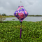 Lozenge shaped handmade purple Hoi An silk lantern with pink rose floral design, traditional Vietnamese decor and lighting.

