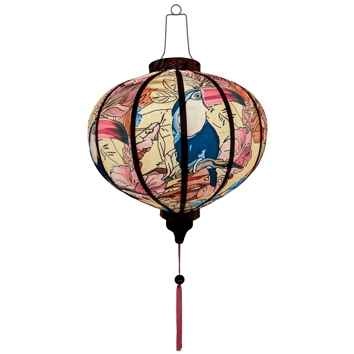 Glowing Vietnamese Lantern with large toucan bird on cream backdrop.