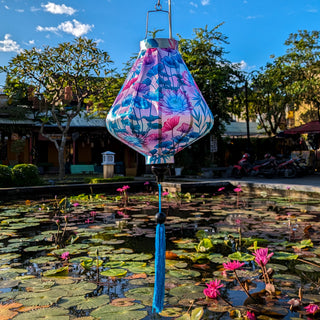 Unique decorative silk lantern featuring soft pastel pinks and rich blues.