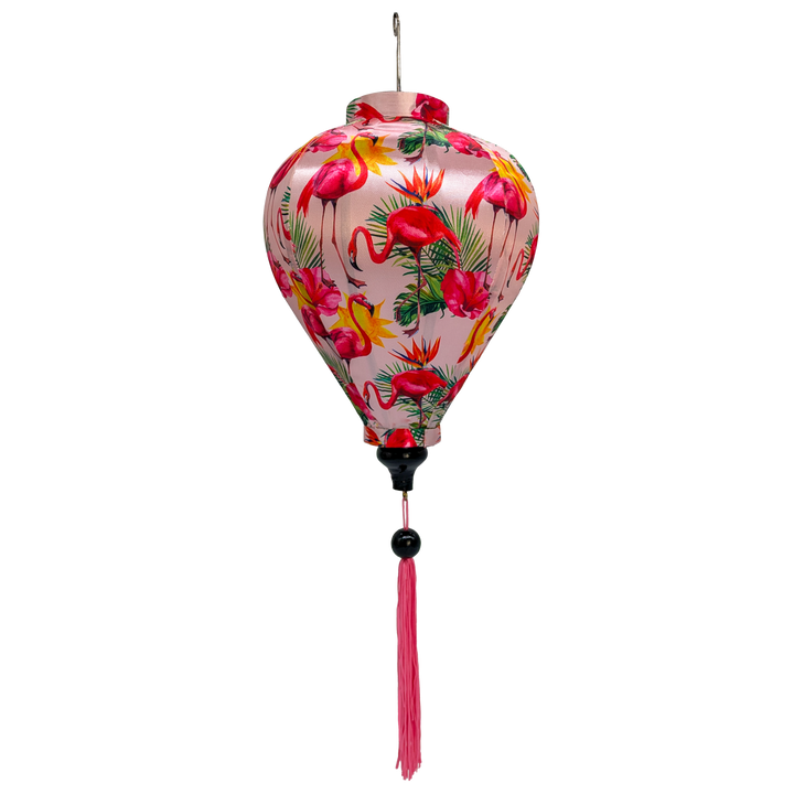 A balloon shaped 30 cm lantern with a print of hot pink flamingos and flowers on a light pink background.