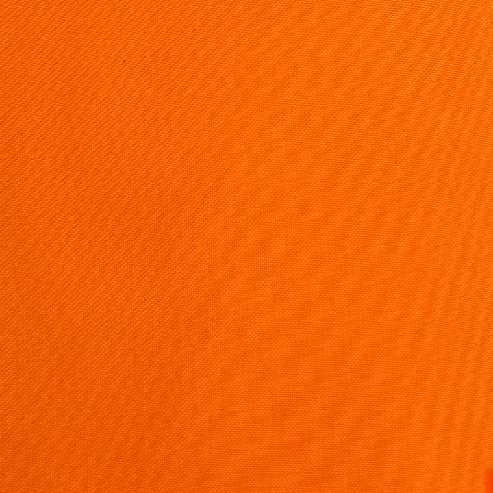 Neon orange polyester silk fabric used for creating Vietnamese lanterns in Hoi An.