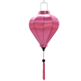 Handmade Balloon shaped Hoi An silk lantern with pink tassel in soft pink, traditional Vietnamese decor for warm ambient lighting.