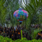 Colorful round Hoi An silk lantern with intricate rainbow paisley patterns, handcrafted in Hoi An.