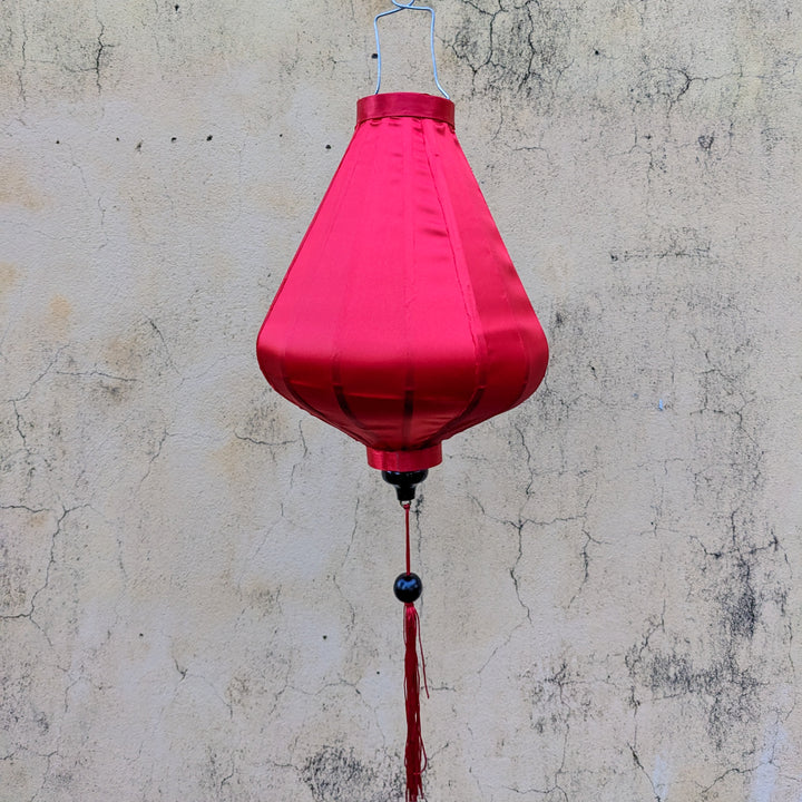 Red plain silk Vietnamese lantern handmade in Hoi An in Teardrop shape with red tassel.