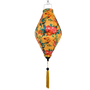 Tube shape hanging lantern with floral pattern and butterflies on a yellow background