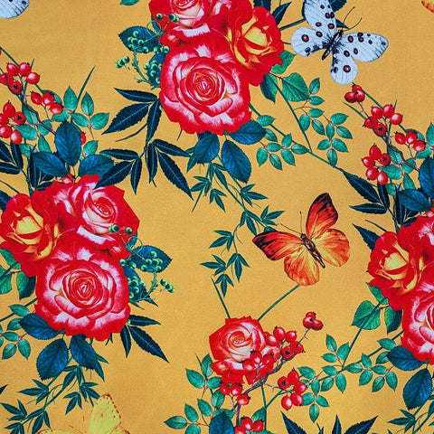 Floral pattern with red roses, green leaves, and butterflies on a yellow background