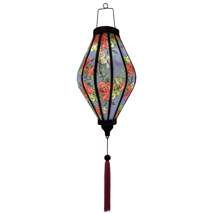 Glowing Tube lantern with a print of pink roses and purple flowers against gorgeous purple background.