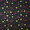 Polyester silk fabric with a print of flying swallows with striking red and blue wings set against a bold black backdrop adorned with diamonds and yellow daisy flowers. 