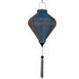Blue and gold hanging lantern with grey tassel.