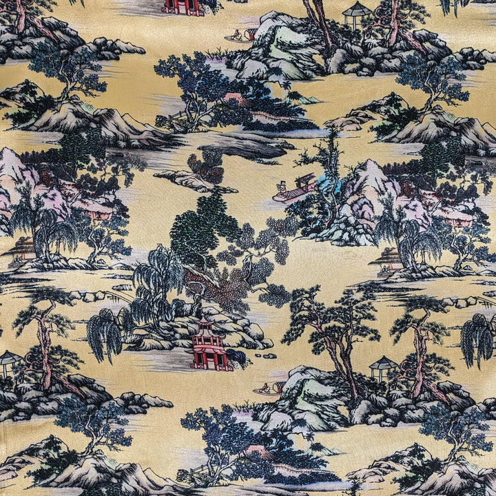 A close up of polyester silk fabric featuring a print of mountains, trees, temples, men in boats, and large rocks. A beautiful palette of light pinks and purples against a serene creamy background.