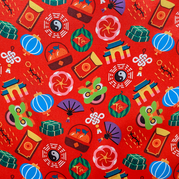 Colourful traditional Lunar New Year motifs patterns on a red background