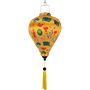 Balloon shaped Vietnamese silk lantern with colourful Lunar New Year patterns on a yellow background