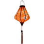 Glowinf silk lantern in warm orange, showcasing timeless Asian crane and tree motifs.