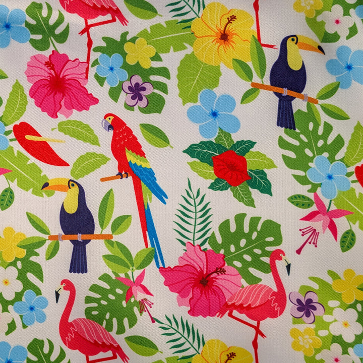 Polyester silk fabric with tropical birds, flowers, and leaves on a white background