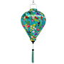 Balloon shaped lantern with tropical bird and flower design on a teal blue background