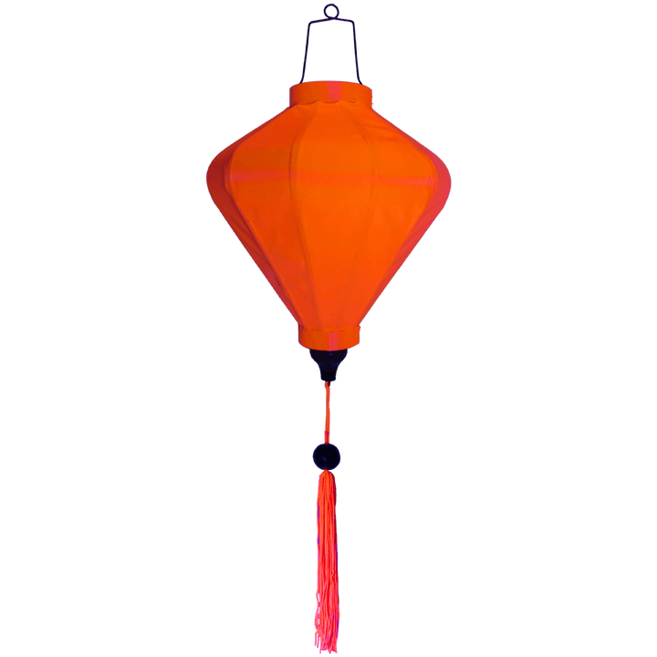Diamond shape neon orange Vietnamese silk lantern glowing under UV light creating a UV glow.