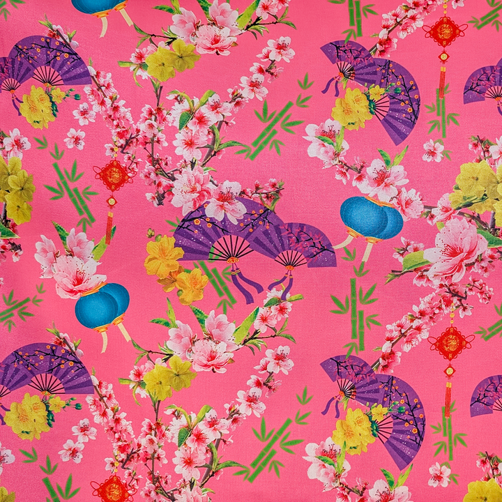 Polyester silk fabric with colourful pattern of purple fans, flowers, and bamboo on a pink background.