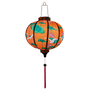 Glowing round Vietnamese silk lantern.