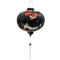 Round Vietnamese silk lantern with white tassel featuring a print of swooping white cranes and falling orange flowers against black backdrop.