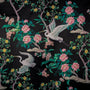 Polyester silk fabric with large white birds and flowers on a black background