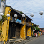Traditional yellow building with white lanterns in Old Town, Hoi An.
