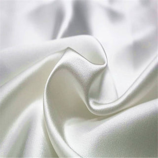 Close up of white polyester silk fabric.