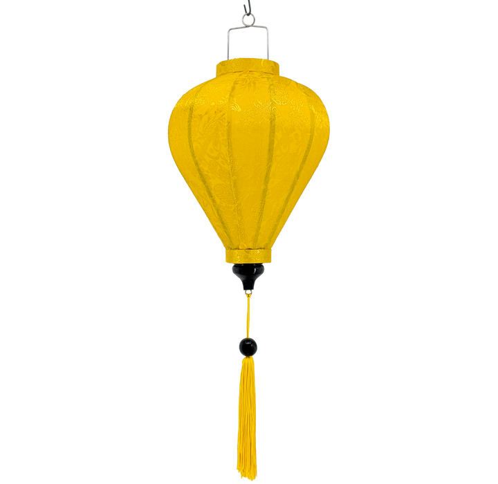 Yellow balloon shaped jacquard silk lantern with a matching tassel.