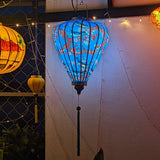 Glowing Balloon shaped Vietnamese silk lantern for sale.