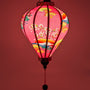 Glowing soft pink silk lantern, handmade in Hoi An, perfect for weddings, home decor, and cozy lighting.