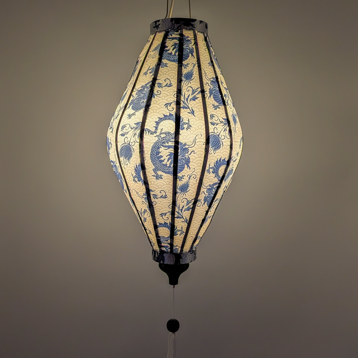 Glowing Tube shape Vietnamese silk lantern with blue dragon pattern on a white background