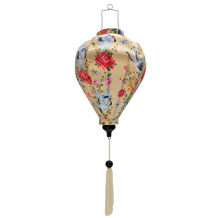 balloon shaped Vietnamese silk and bamboo lantern with print of graceful cranes, vibrant chrysanthemums, and delicate dragonflies on cream background.