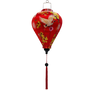A balloon shaped Vietnamese lantern with red headed cranes in flight, pink and yellow flowers, firecrackers and orange lanterns print and red tassel.