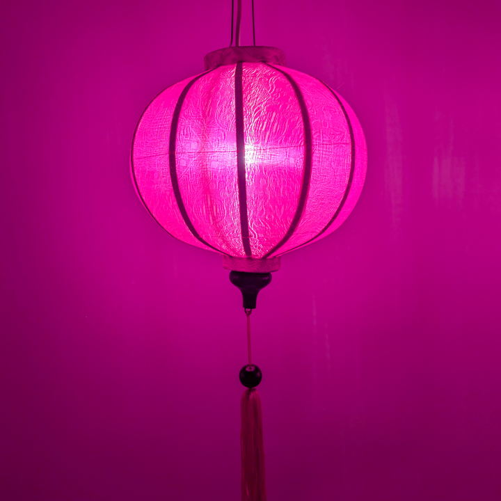 Glowing pink jacquard silk lantern.
