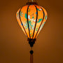 Glowing balloon shape lantern. This vibrant lantern is the perfect addition to home decor, festive celebrations, or as a meaningful gift.