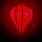 Glowing balloon shape red Vietnamese silk lantern.