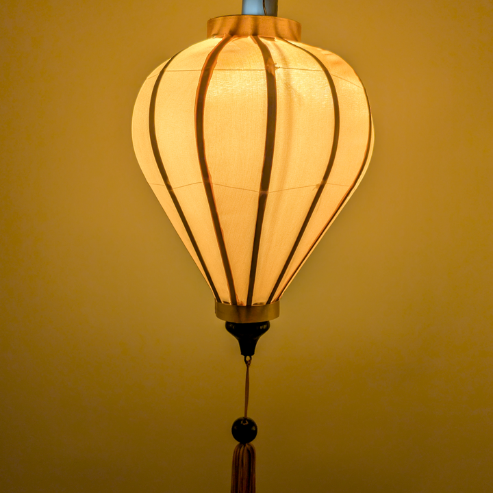 Plain Gold Silk lantern with a warm glow.