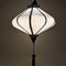 Glowing UFO shaped lantern in plain grey super silk.