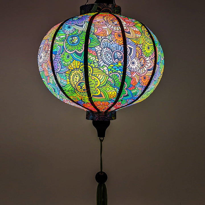 Artisan-crafted silk lantern featuring a mesmerizing paisley print in multicolor hues.
