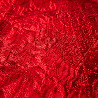 close up of red jacquard silk fabric