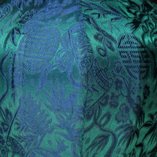 close up of royal blue and teal colour jacquard silk fabric