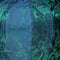 A close up of royal blue and teal colour jacquard silk fabric.