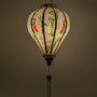 Glowing balloon shape handcrafted from luxurious polyester silk, with a charming countryside scene featuring women in áo dài, bamboo groves, and little boys playing an instrument while sitting on water buffalos. 