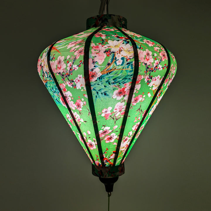 Green hue created by our Vietnamese silk lanterns handmade in Hoi An.