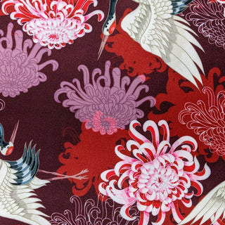 Polyester silk fabric with cranes and chrysanthemums on purple for silk lanterns handmade in Hoi An.