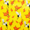 Polyester silk fabric with a print of cranes surrounded by orange flowers on a bright yellow background.