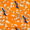 Orange polyester silk fabric with a print of bluebirds perched on branches amidst white flower blossoms.