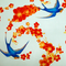 Polyester white silk with a print of blue swallows flying around red flowers. This fabric is used to create Vietnamese silk lanterns in Hoi An, Quang Nam, Vietnam.