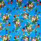 Blue polyester silk fabric with a print of wild flowers in a rainbow of colours.